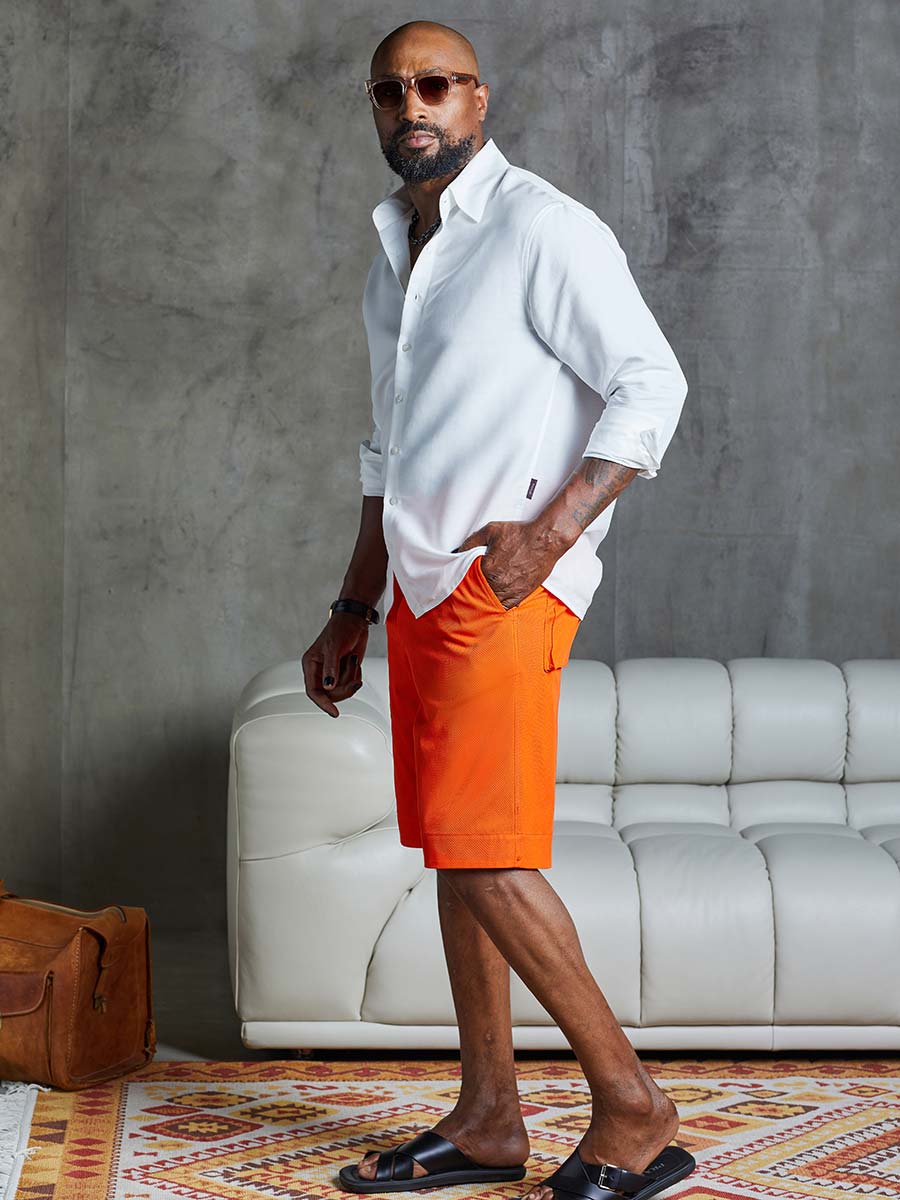 Orange shorts hot sale outfit mens